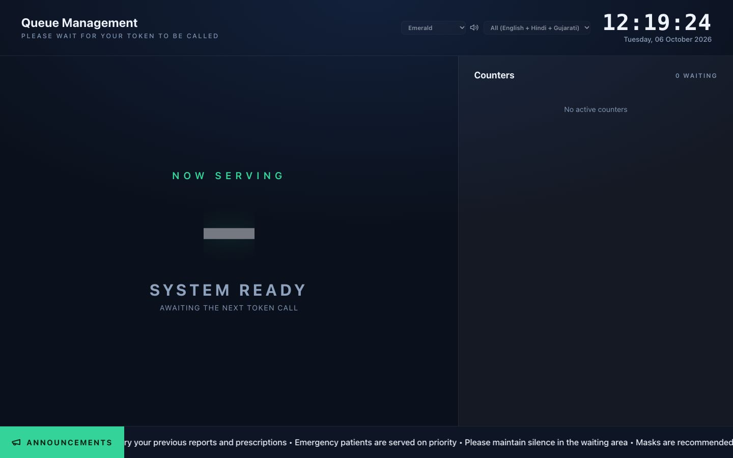 El tablero TV con Now Serving, mostradores y avisos.